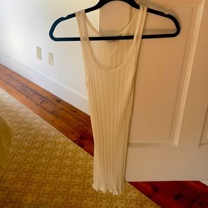 Sheer rubber white tank. Fitted. One size fits most.